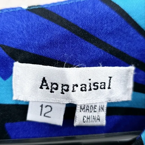 Appraisal Blue Geometric Sheath Dress
