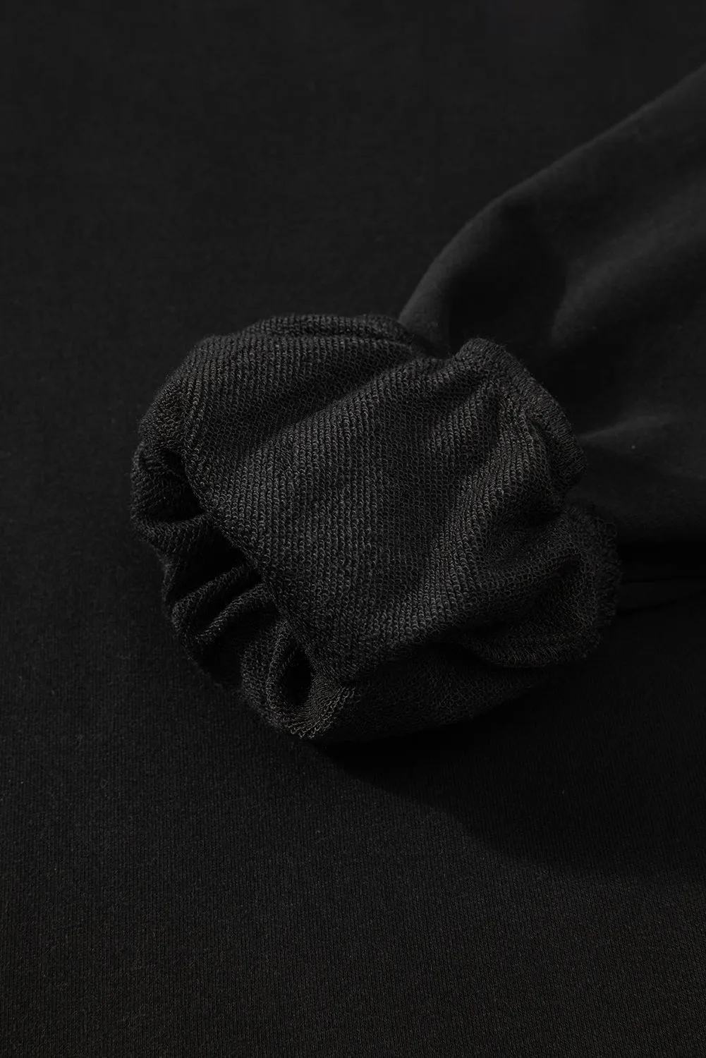 Black Solid O Neck High Low Hem Pullover Sweatshirt