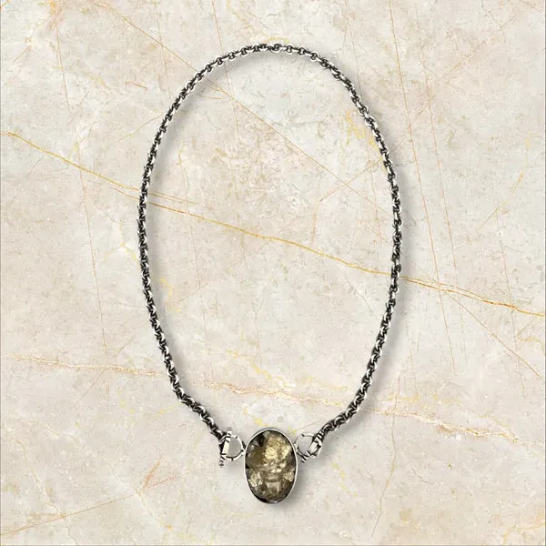 Lemon Quartz and Pyrite rough set in an oval Sterling silver bezel with handmade chain